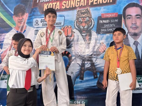 Keren ! Maulana Maliq Ibrahim Juara 1 Taekwondo Liga Pelajar Kota Sungai Penuh